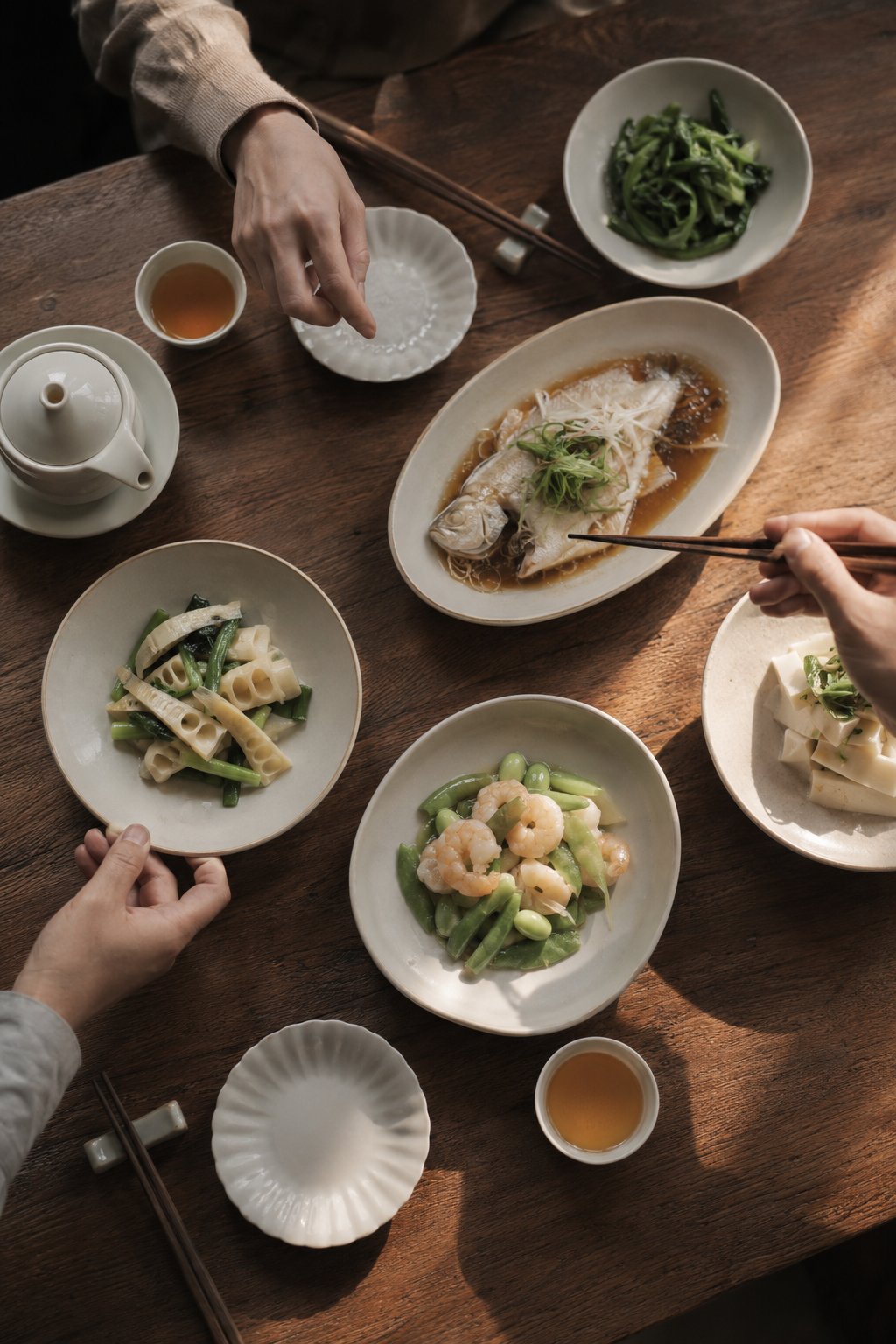 Shared Chinese meal on a refined table