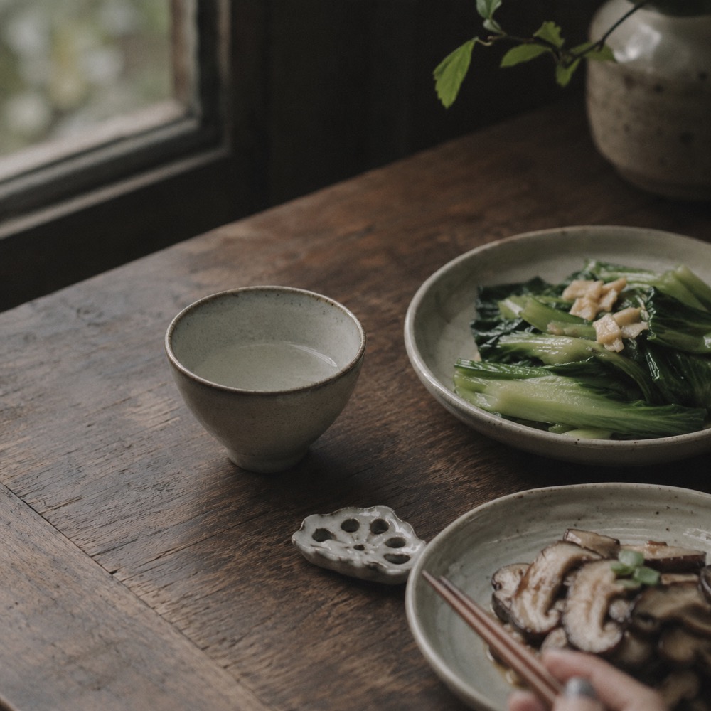 Shared regional meal arranged across a wooden table